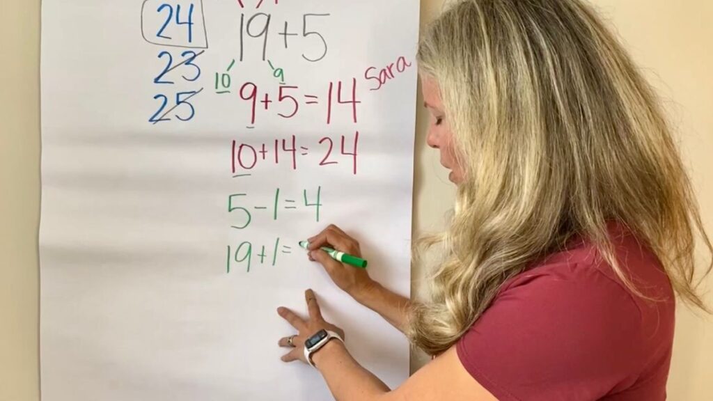 Teacher doing an addition number talk